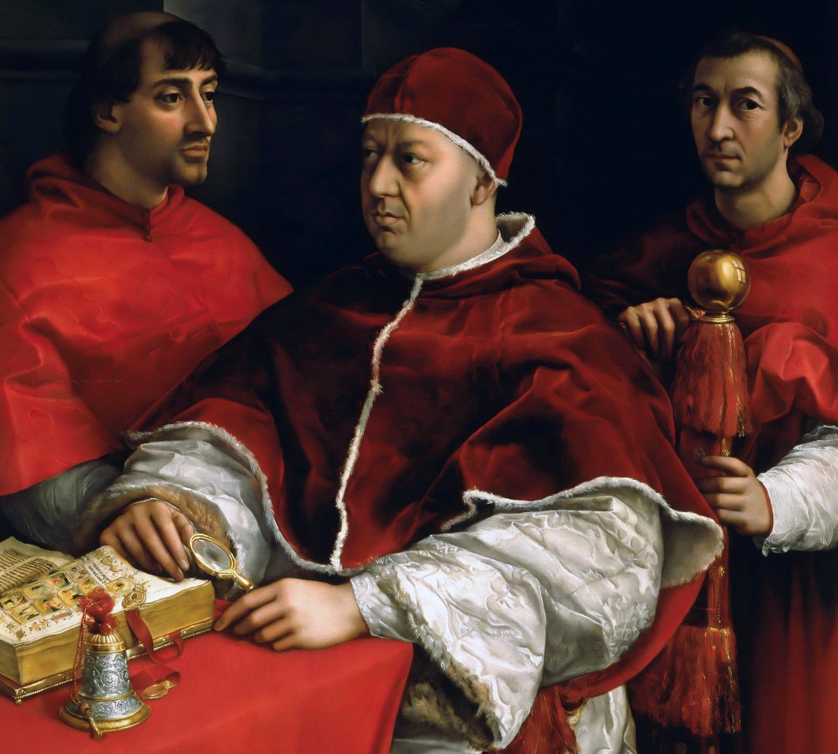 En esta pintura de 1518, el artista italiano Rafael muestra al papa León X (centro) flanqueado por dos cardenales. León fue cabeza de la Iglesia desde 1513 hasta 1521.