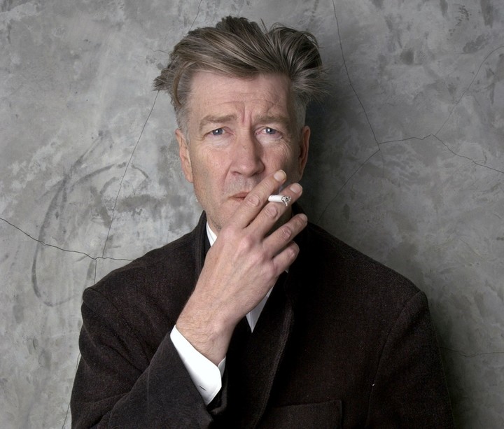 FILE - Filmmaker David Lynch poses at his Los Angeles home March 14, 2002. (AP Photo/Chris Weeks, File)